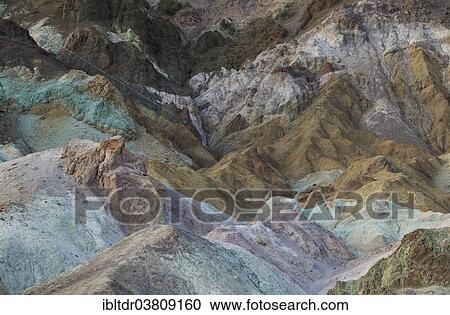 Stock Image - "The colorful rocks of the Artist's Palette at dusk, Black Mountains, Death Valley, Death Valley National Park, California, USA". Fotosearch