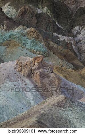 Stock Image - "The colorful rocks of the Artist's Palette at dusk, Black Mountains, Death Valley, Death Valley National Park, California, USA". Fotosearch