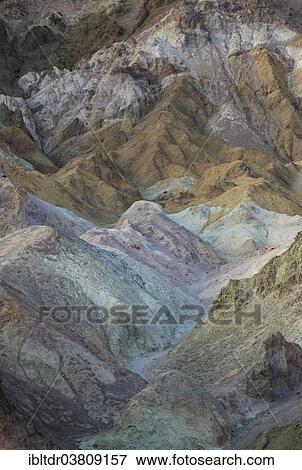 Stock Photo - "The colorful rocks of the Artist's Palette at dusk, Black Mountains, Death Valley, Death Valley National Park, California, USA". Fotosearch