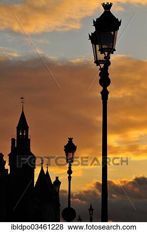 "The Conciergerie and the typical Parisian street lights against dramatic clouds in the evening, Paris, Ile-de-France, France, Europe" View Large Photo Image Stock Photo - "The Conciergerie and the typical Parisian street lights against dramatic clouds in the evening, Paris, Ile-de-France, France, Europe". Fotosearch