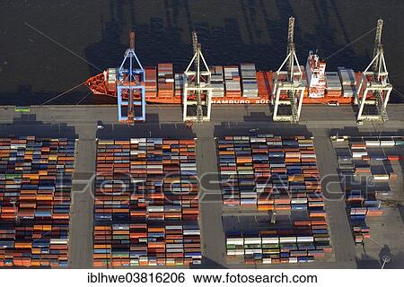 Stock Photograph - "The container ship Santa Teresa of the Hamburg Sud shipping company being loaded and unloaded at Burchardkai container terminal, Hamburg, Germany, Europe". Fotosearch