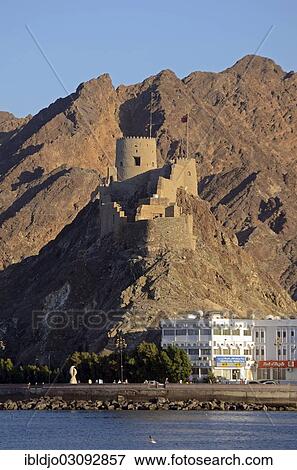 Stock Photo - "The corniche of Muttrah and the rocky mountains that surround the city at back, Muttrah, Muscat Governorate (Capital Area, Oman, Asia". Fotosearch