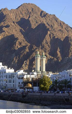 "The corniche of Muttrah in front of the rocky mountains that surround the city at back, Muttrah, Muscat Governorate (Capital Area, Oman, Asia" View Large Photo Image Stock Photography - "The corniche of Muttrah in front of the rocky mountains that surround the city at back, Muttrah, Muscat Governorate (Capital Area, Oman, Asia". Fotosearch