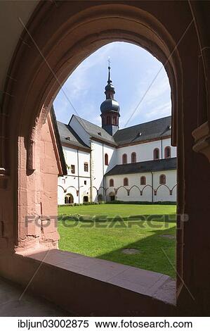"The crossing tower with a Welsh canopy and the north facade of the three-aisled Romanesque basilica, Eberbach Abbey, Kloster Eberbach, Eltville, Hesse, Germany, Europe" View Large Photo Image Stock Photography - "The crossing tower with a Welsh canopy and the north facade of the three-aisled Romanesque basilica, Eberbach Abbey, Kloster Eberbach, Eltville, Hesse, Germany, Europe". Fotosearch