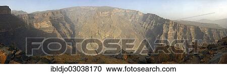 "The deep canyon of the Wadi Ghul, Al Hajar mountains, Ad Dhahirah, Oman, Asia" View Large Photo Image Stock Image - "The deep canyon of the Wadi Ghul, Al Hajar mountains, Ad Dhahirah, Oman, Asia". Fotosearch