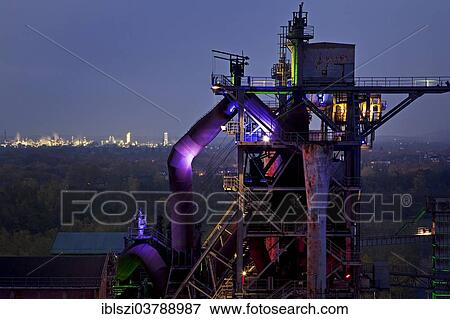 "The disused steelworks in Landschaftspark Duisburg-Nord, public park on a former industrial site, illuminated at dusk with blast furnace No 2, Duisburg, North Rhine-Westphalia, Germany, Europe" View Large Photo Image Stock Photo - "The disused steelworks in Landschaftspark Duisburg-Nord, public park on a former industrial site, illuminated at dusk with blast furnace No 2, Duisburg, North Rhine-Westphalia, Germany, Europe". Fotosearch