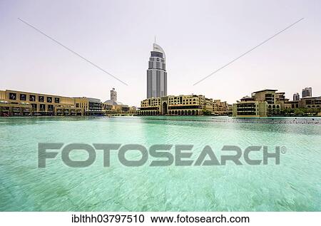 Stock Image - "The Dubai Mall with the The Address Downtown Dubai skyscraper, Dubai, United Arab Emirates, Asia". Fotosearch