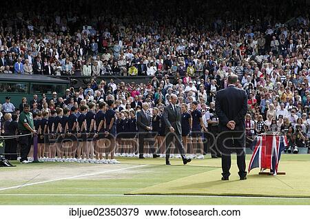 "The Duke of Kent passing through a lane of ball kids on Centre Court to attend the awards ceremony, Wimbledon Championships 2012, AELTC, London, ITF Grand Slam Tennis Tournament, women's final, London, England, United Kingdom, Europe" View Large Photo Image Stock Photo - "The Duke of Kent passing through a lane of ball kids on Centre Court to attend the awards ceremony, Wimbledon Championships 2012, AELTC, London, ITF Grand Slam Tennis Tournament, women's final, London, England, United Kingdom, Europe". Fotosearch