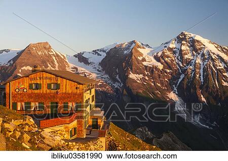 "The Edelweisshuette refuge on Mt Edelweissspitze, mountains Hohe Dock and Grosses Wiesbachhorn at back, Grossglockner Hochalpenstrasse, Hohe Tauern, Zell am See District, Salzburg State, Austria, Europe" View Large Photo Image Stock Image - "The Edelweisshuette refuge on Mt Edelweissspitze, mountains Hohe Dock and Grosses Wiesbachhorn at back, Grossglockner Hochalpenstrasse, Hohe Tauern, Zell am See District, Salzburg State, Austria, Europe". Fotosearch