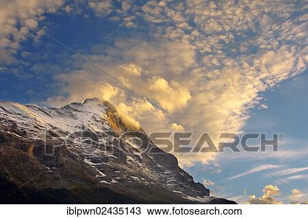 "The Eiger North Face at sunset with clouds, Grindelwald, Alps, Switzerland, Europe" View Large Photo Image Stock Image - "The Eiger North Face at sunset with clouds, Grindelwald, Alps, Switzerland, Europe". Fotosearch