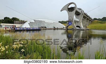 Stock Image - "The Falkirk Wheel, unique boat lift in the shape of a ferris wheel, connecting the Forth and Clyde Canal with the Union Canal, Falkirk, Central Scotland, United Kingdom, Europe". Fotosearch