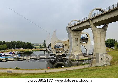 "The Falkirk Wheel, unique boat lift in the shape of a ferris wheel, connecting the Forth and Clyde Canal with the Union Canal, Falkirk, Central Scotland, United Kingdom, Europe" View Large Photo Image Stock Photo - "The Falkirk Wheel, unique boat lift in the shape of a ferris wheel, connecting the Forth and Clyde Canal with the Union Canal, Falkirk, Central Scotland, United Kingdom, Europe". Fotosearch