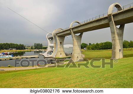 "The Falkirk Wheel, unique boat lift in the shape of a ferris wheel, connecting the Forth and Clyde Canal with the Union Canal, Falkirk, Central Scotland, United Kingdom, Europe" View Large Photo Image Stock Photograph - "The Falkirk Wheel, unique boat lift in the shape of a ferris wheel, connecting the Forth and Clyde Canal with the Union Canal, Falkirk, Central Scotland, United Kingdom, Europe". Fotosearch
