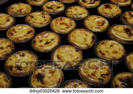 Stock Photo - "The famous pasteis cream tarts of the Confeitaria dos Pasteis de Belem pastry shop, Belem, Lisbon, Lisbon District, Portugal, Europe". Fotosearch