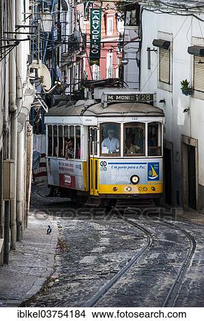 "The famous tram 28 travelling through the old quarter, Alfama, Lisbon, Lisbon District, Portugal, Europe" View Large Photo Image Picture - "The famous tram 28 travelling through the old quarter, Alfama, Lisbon, Lisbon District, Portugal, Europe". Fotosearch
