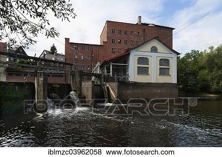 "The former Wolfsgrubermuhle, a water mill, at the weir on the Pegnitz River, in operation from the 18th century until 1972, at the front a new hydropower plant, Furth, Middle Franconia, Bavaria, Germany, Europe" View Large Photo Image Stock Photo - "The former Wolfsgrubermuhle, a water mill, at the weir on the Pegnitz River, in operation from the 18th century until 1972, at the front a new hydropower plant, Furth, Middle Franconia, Bavaria, Germany, Europe". Fotosearch