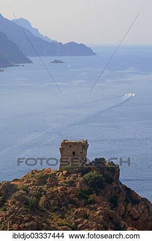 "The Genoese Tower of Porto on top of a rocky hill and the Gulf of Porto, Guaita, Porto, Corsica, France, Europe" View Large Photo Image Picture - "The Genoese Tower of Porto on top of a rocky hill and the Gulf of Porto, Guaita, Porto, Corsica, France, Europe". Fotosearch