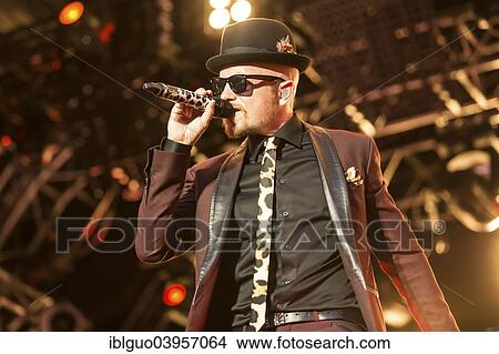 "The German rapper and musician Jan Delay with band performing live at Heitere Open Air, Zofingen, Canton of Aargau, Switzerland, Europe" View Large Photo Image Picture - "The German rapper and musician Jan Delay with band performing live at Heitere Open Air, Zofingen, Canton of Aargau, Switzerland, Europe". Fotosearch