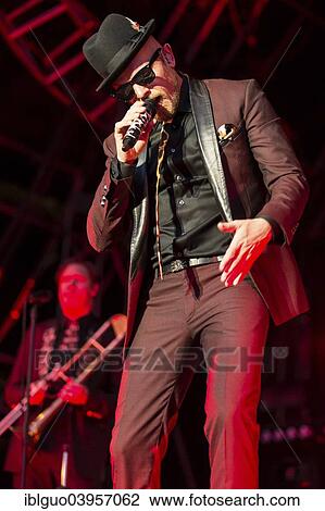 "The German rapper and musician Jan Delay with band performing live at Heitere Open Air, Zofingen, Canton of Aargau, Switzerland, Europe" View Large Photo Image Stock Image - "The German rapper and musician Jan Delay with band performing live at Heitere Open Air, Zofingen, Canton of Aargau, Switzerland, Europe". Fotosearch