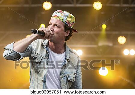 Stock Image - "The German rapper Dendemann performing live at Heitere Open Air, Zofingen, Canton of Aargau, Switzerland, Europe". Fotosearch