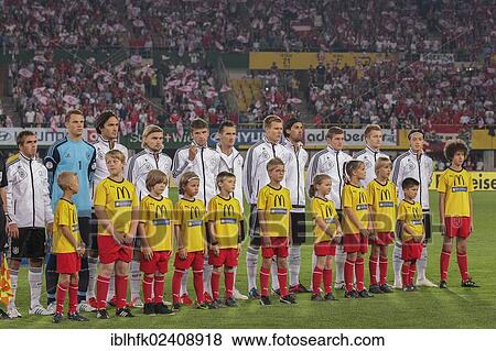 "The German team during the national anthem before the WC qualifier soccer game on September 11, 2012 in Vienna, Austria, Europe" View Large Photo Image Stock Photo - "The German team during the national anthem before the WC qualifier soccer game on September 11, 2012 in Vienna, Austria, Europe". Fotosearch