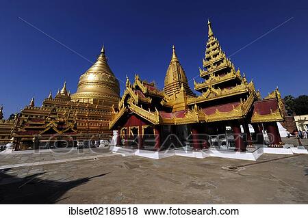 "The golden Shwezigon Pagoda, most famous temple in Bagan, Myanmar, Burma, Southeast Asia, Asia" View Large Photo Image Stock Photo - "The golden Shwezigon Pagoda, most famous temple in Bagan, Myanmar, Burma, Southeast Asia, Asia". Fotosearch