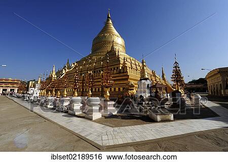 "The golden Shwezigon Pagoda, most famous temple in Bagan, Myanmar, Burma, Southeast Asia, Asia" View Large Photo Image Stock Photograph - "The golden Shwezigon Pagoda, most famous temple in Bagan, Myanmar, Burma, Southeast Asia, Asia". Fotosearch