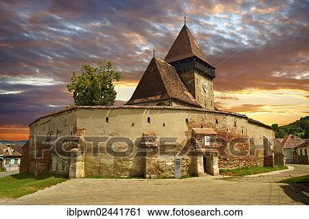 Stock Image - "The Gothic 14th century Axente Sever Saxon Evangelical fortified church, Sibiu, Transylvania, Romania, Europe". Fotosearch
