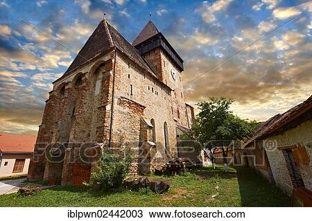 Stock Image - "The Gothic 14th century Axente Sever, Saxon Evangelical fortified church, Sibiu, Transylvania, Romania, Europe". Fotosearch