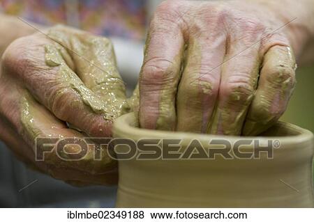 Stock Photo - "The hands of the Russian painter and sculptor Alexey Maksimenko doing pottery, Berlin, Germany, Europe". Fotosearch