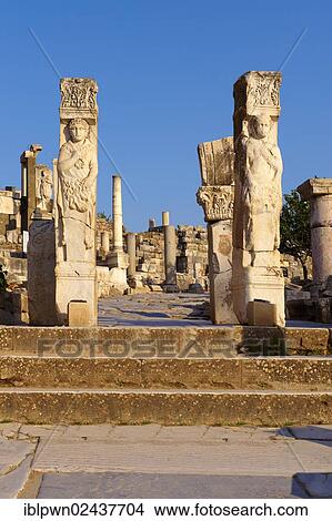 Picture - "The Heracles Gate at the begining of Curetes Street, showing Heracles wrapped in a Nemea Lion skin, probably made in the 2nd century A. D. and moved to Ephesus in the 5th century A. D., Ephesus Archaeological Site, Anatolia, Turkey, Asia". Fotosearch