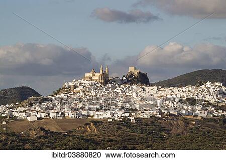 Stock Image - "The hilltop White Town of Olvera with La Encarnacion church and the Moorish castle, Cadiz province, Andalusia, Spain, Europe". Fotosearch