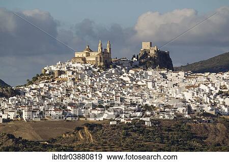 "The hilltop White Town of Olvera with La Encarnacion church and the Moorish castle, Cadiz province, Andalusia, Spain, Europe" View Large Photo Image Stock Photo - "The hilltop White Town of Olvera with La Encarnacion church and the Moorish castle, Cadiz province, Andalusia, Spain, Europe". Fotosearch