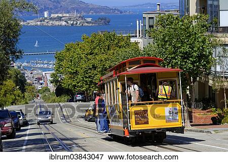 "The historic cable car on Hyde Street, the former prison island of Alcatraz at the back, San Francisco, California, USA" View Large Photo Image Stock Photo - "The historic cable car on Hyde Street, the former prison island of Alcatraz at the back, San Francisco, California, USA". Fotosearch