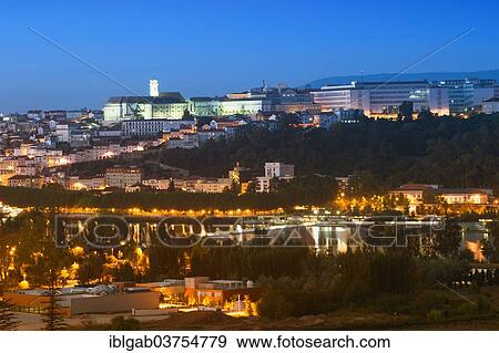 "The historic district and the University of Coimbra, a UNESCO World Heritage Site, seen from across the Mondego river at night, Coimbra, Centro Region, Portugal, Europe" View Large Photo Image Stock Photo - "The historic district and the University of Coimbra, a UNESCO World Heritage Site, seen from across the Mondego river at night, Coimbra, Centro Region, Portugal, Europe". Fotosearch
