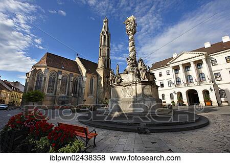 "The Holy Trinity Statue and the Goat's Church, Kecske templom, Fo Square, Sopron, Hungary, Europe" View Large Photo Image Stock Photo - "The Holy Trinity Statue and the Goat's Church, Kecske templom, Fo Square, Sopron, Hungary, Europe". Fotosearch