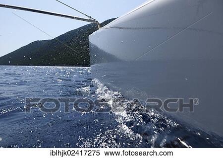 The hull of a catamaran floating on the water, Vassiliki, Lefkas, Greece, Europe View Large Photo Image Stock Photography - The hull of a catamaran floating on the water, Vassiliki, Lefkas, Greece, Europe. Fotosearch