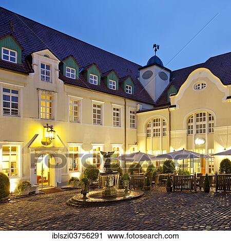 "The illuminated courtyard of Engelsburg castle, at dusk, historic center, Recklinghausen, North Rhine-Westphalia, Germany, Europe" View Large Photo Image Stock Image - "The illuminated courtyard of Engelsburg castle, at dusk, historic center, Recklinghausen, North Rhine-Westphalia, Germany, Europe". Fotosearch