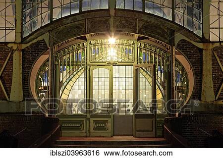 Stock Photograph - "The illuminated entrance portal to the machine hall of Zollern II-IV, Dortmund, Ruhr district, North Rhine-Westphalia, Germany, Europe". Fotosearch