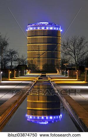 "The illuminated Gasometer at dusk, blue hour, Oberhausen, Ruhr Area, North Rhine-Westphalia, Germany, Europe" View Large Photo Image Stock Image - "The illuminated Gasometer at dusk, blue hour, Oberhausen, Ruhr Area, North Rhine-Westphalia, Germany, Europe". Fotosearch