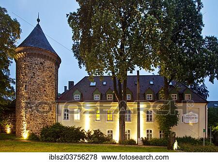 "The illuminated Stephansturm, tower of St. Stephen, with the Engelsburg castle, at dusk, Recklinghausen, North Rhine-Westphalia, Germany, Europe" View Large Photo Image Stock Photo - "The illuminated Stephansturm, tower of St. Stephen, with the Engelsburg castle, at dusk, Recklinghausen, North Rhine-Westphalia, Germany, Europe". Fotosearch