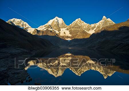 "The lake Laguna Carhuacocha in the morning, from left Mt Siula, Mt Yerupaja Grande, Mt Yerupaja Chico and Mt Jirishanca, Cordillera Huayhuash mountain range, Northern Peru, Peru, South America" View Large Photo Image Stock Photography - "The lake Laguna Carhuacocha in the morning, from left Mt Siula, Mt Yerupaja Grande, Mt Yerupaja Chico and Mt Jirishanca, Cordillera Huayhuash mountain range, Northern Peru, Peru, South America". Fotosearch