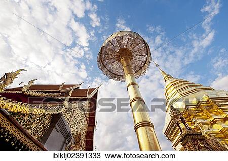Stock Image - "The large golden chedi at Wat Doi Suthep Buddhist temple, Chiang Mai, Thailand, Asia". Fotosearch