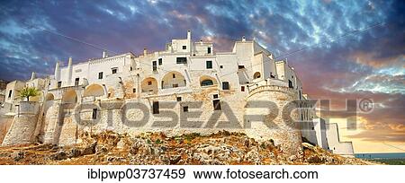 Stock Photo - "The medieval fortified hill town of Ostuni, """"La Citta Bianca"""", """"the White Town"""", Ostuni, Apulia, Italy, Europe". Fotosearch
