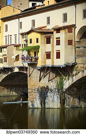 Stock Image - "The medieval Ponte Vecchio bridge crossing the River Arno in the historic centre of Florence, UNESCO World Heritage Site, Florence, Tuscany, Italy, Europe". Fotosearch