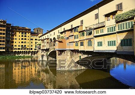Stock Image - "The medieval Ponte Vecchio bridge crossing the River Arno in the historic centre of Florence, UNESCO World Heritage Site, Florence, Tuscany, Italy, Europe". Fotosearch