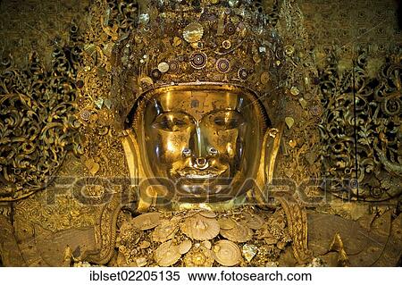 "The most revered golden Mahamuni Buddha in Mandalay, Burma, Myanmar, Southeast Asia, Asia" View Large Photo Image Stock Photography - "The most revered golden Mahamuni Buddha in Mandalay, Burma, Myanmar, Southeast Asia, Asia". Fotosearch