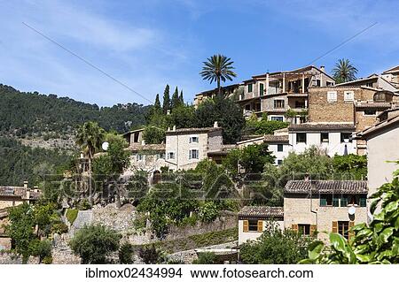 "The mountain village of Deia, Serra de Tramuntana, Northwest Coast, Mallorca, Majorca, Balearic Islands, Spain, Europe" View Large Photo Image Picture - "The mountain village of Deia, Serra de Tramuntana, Northwest Coast, Mallorca, Majorca, Balearic Islands, Spain, Europe". Fotosearch