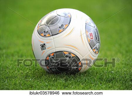 Stock Photograph - "The new Adidas Bundesliga football on the pitch, Telekom Cup 2013 in Borussia Park Moenchengladbach, Monchengladbach, North Rhine-Westphalia, Germany, Europe". Fotosearch
