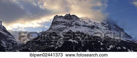 Stock Image - "The north face of the Eiger mountain at sunset from Grindelwald, Swiss Alps, Switzerland, Europe". Fotosearch